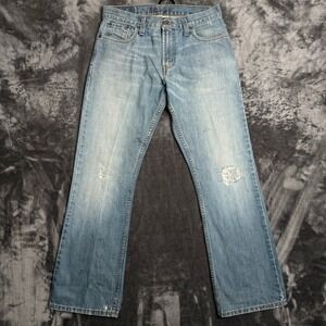 Levis 527 Low Boot Cut Jeans Mens 30x30 Light Wash Distressed Blue Denim